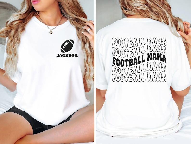 May include: White t-shirt with a football graphic and the name "JACKSON" printed on the front. The back of the shirt has the text "FOOTBALL MAMA" repeated five times in a retro font.