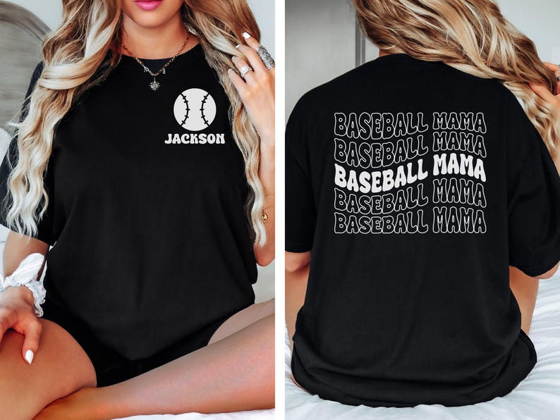 May include: Black t-shirt with a white baseball graphic and the name "Jackson" on the front. The back of the shirt has the text "Baseball Mama" repeated five times in a wavy font.