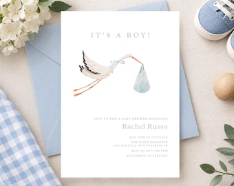 Könnte beinhalten: Eine weiße Einladungskarte für eine Babyparty mit einer Aquarellillustration eines Storchs, der ein blaues Bündel trägt. Der Text lautet IT'S A BOY! JOIN US FOR A BABY SHOWER HONORING RACHEL RUSSO, MAY 14TH AT 1 O'CLOCK, THE SMITH RESIDENCE, 1234 NAUTICAL WAY FRANKLIN TN, RSVP TO (918) 499-8888, REGISTERED AT BABYLIST.