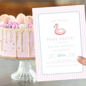 May include: A pink cake with white icing drips and macarons sits next to a pool party invitation. The invitation has a flamingo float graphic and text that reads "Pool Party!" and details for Rachel Russo's 5th birthday.