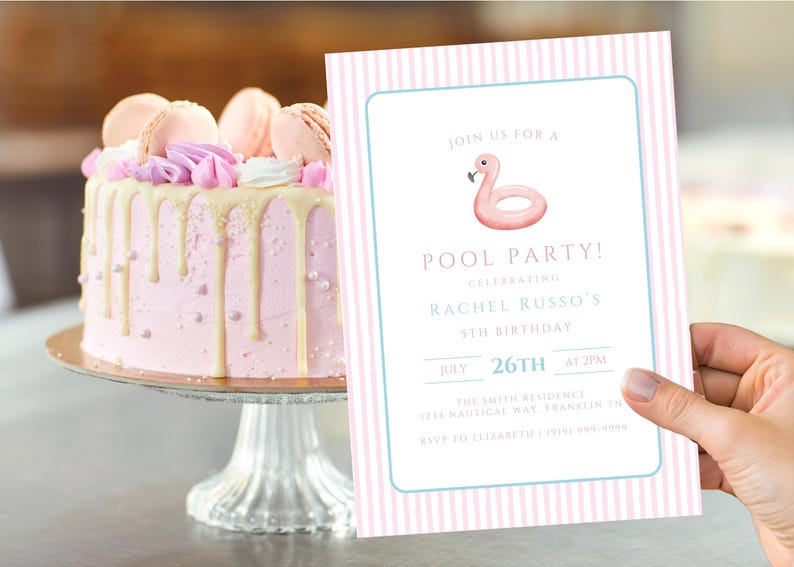 May include: A pink cake with white icing drips and macarons sits next to a pool party invitation. The invitation has a flamingo float graphic and text that reads "Pool Party!" and details for Rachel Russo's 5th birthday.