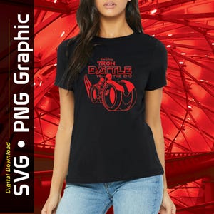 May include: Black t-shirt featuring a red graphic of a futuristic vehicle and the text "Tron Battle to the End." The shirt is a crew neck style and is paired with blue jeans. The image also includes the text "SVG • PNG Graphic" and "Digital Download."