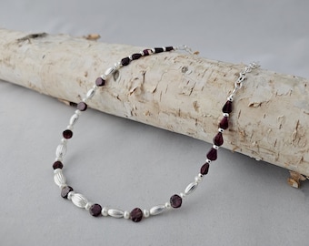 Garnet, the January Birthstone, paired with Tiny White Freshwater Pearls and Silver 'Rice' Accents will thrill your New Year Loves