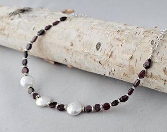 Necklace of Garnet, the January Birthstone, paired with White Pearl Coins and Silver Accents will thrill your New Year Loves