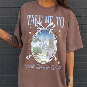 May include: A set of three ceramic mugs with a speckled, matte finish. The mugs are in shades of cream, light gray, and dark gray. Each mug has a simple, minimalist design and a rounded handle.