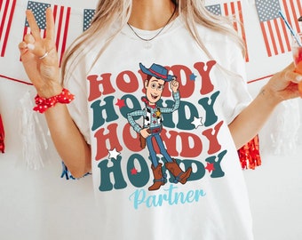 Woody Howdy Partner Comfort Colors T-shirt, 4th Of July Toy Story T-shirt, Disney Patriotic Gift, Disneyland Family Trip, Independence Day