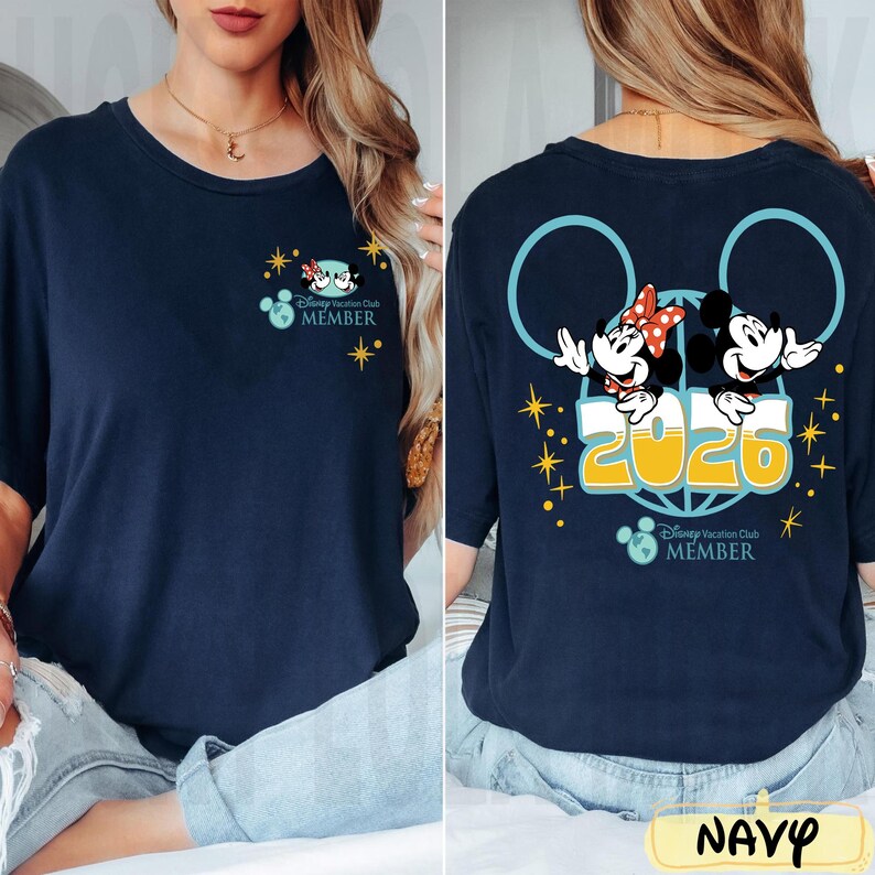 May include: Navy blue t-shirt with Mickey and Minnie Mouse, the text "2026" and "Disney Vacation Club MEMBER". The front has a small graphic, the back a larger design with star accents. A classic design for Disney fans.