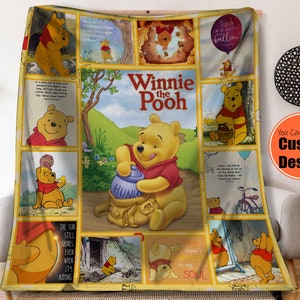 May include: A Winnie the Pooh themed fleece blanket with a colorful patchwork design featuring various images of Winnie the Pooh and his friends. The blanket has quotes about happiness and the sun shining even when it's hiding.