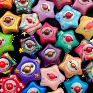 Mystery Clown Baby Star Necklace