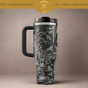 May include: A 40oz black tumbler featuring a white line art design of a swamp landscape with pitcher plants, ferns, and a dragonfly. The tumbler has a black handle and a black lid. The text 40OZ TUMBLER DESIGN SVG + PNG LASER READY is visible.