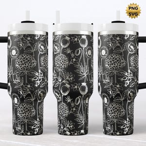 May include: Three black travel mugs with white lids, handles, and straws. The mugs feature a silver floral design of various flowers and leaves. The mugs are designed to keep beverages hot or cold. The mugs are suitable for travel or everyday use.