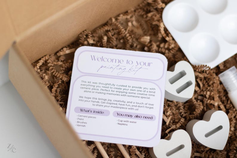 May include: A craft kit with instructions for creating a cement piece. The kit includes cement, paint, brushes, varnish, and a small white tray with four compartments. The instructions include a list of what's inside the kit and what you may also need.