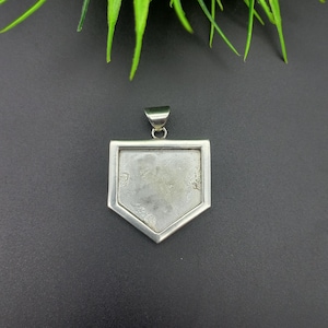 May include: Silver pendant shaped like a baseball home plate. The pendant is blank and ready to be engraved.