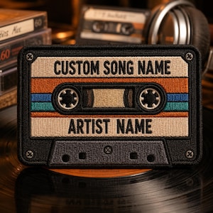 May include: Embroidered patch in the shape of a retro cassette tape. The design features orange, blue, and teal stripes, with the text "CUSTOM SONG NAME" and "ARTIST NAME" in a classic font. The patch has a black border and is mounted on a record.