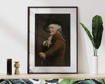 May include: A framed portrait of a man in a brown coat and a black hat, smiling and pointing at the viewer. The frame is black and modern.