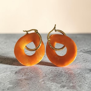 May include: A rustic wooden sign with the text "Welcome to our home" in white lettering. The sign features a distressed finish and a simple, inviting design, perfect for entryway decor.