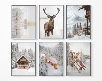 May include: A set of six winter-themed prints featuring a snowy forest, a red train, a cabin, a deer, a mountain range, and a sled. The prints are all in black frames.
