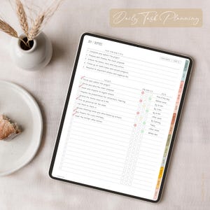May include: A digital tablet displaying a daily task planning layout. The screen shows a to-do list with checkboxes, priority indicators, and due dates. The text "Daily Task Planning" is at the top. A vase with dried plants and a plate with a piece of bread are in the background.