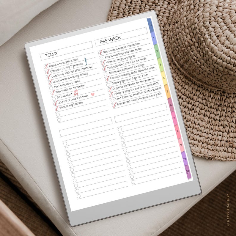 May include: A digital planner with a white screen displays daily and weekly to-do lists. The planner includes sections for 'Today' and 'This Week', with checkboxes for tasks like 'Respond to urgent emails' and 'Attend meetings'. A straw hat rests in the background.