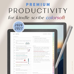 Peut inclure: Un agenda numérique pour Kindle Scribe Colorsoft avec un emploi du temps quotidien, des priorités et une section notes. L'écran affiche le texte 2026 et 2027, avec un stylet sur la droite. L'interface comprend des onglets pour les mois.