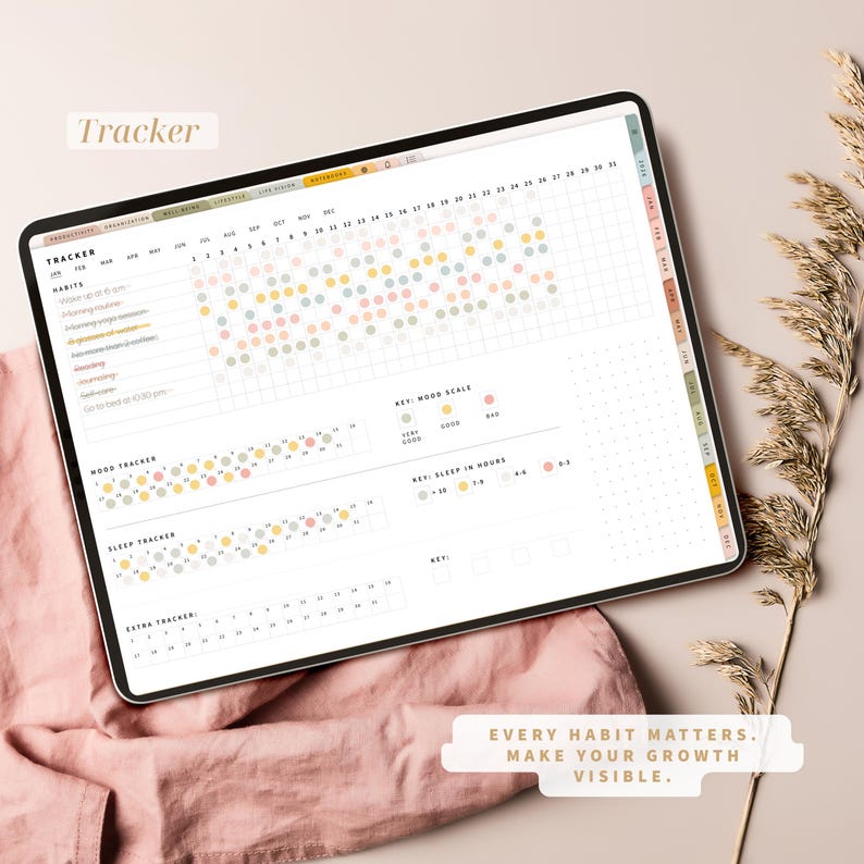Pode incluir: Um rastreador de h&aacute;bitos digital exibido em um tablet. A tela mostra uma grade com pontos coloridos para rastrear h&aacute;bitos, humor e sono. O texto na tela inclui "Tracker" e "Every habit matters. Make your growth visible."