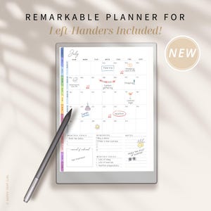 Puede incluir: Un planificador digital para zurdos, con un dise&ntilde;o de calendario de julio, iconos de eventos y notas. El planificador incluye objetivos mensuales, recordatorios y una secci&oacute;n de enfoque. Se incluye un l&aacute;piz &oacute;ptico. El texto dice "Remarkable Planner for Left-Handers Included!"