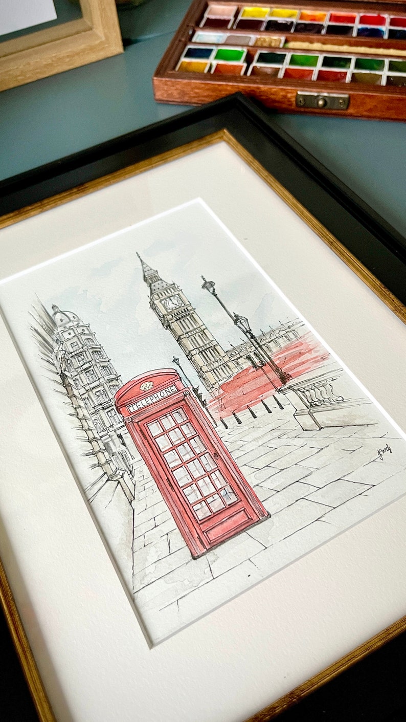 Close-up of Big Ben and London’s red telephone booth watercolor poster in art deco frame