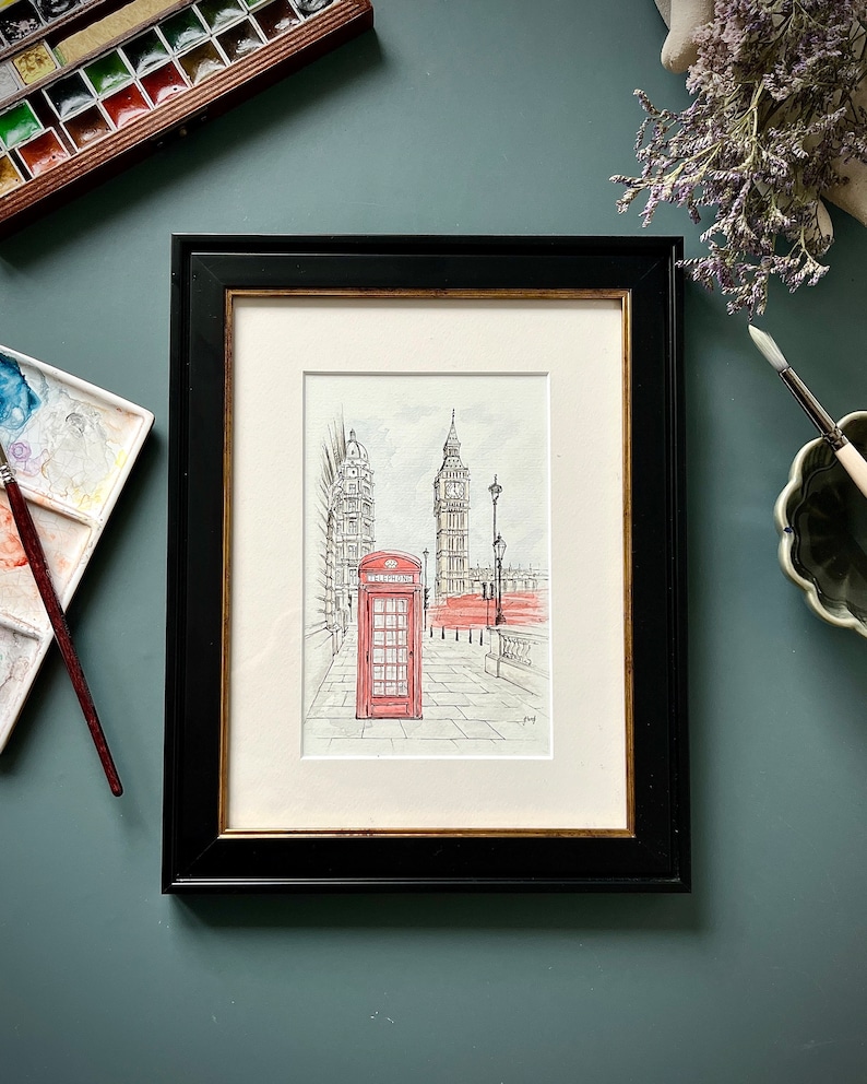 Framed London street scene with red phone booth, unique wall art print for contemporary interiors