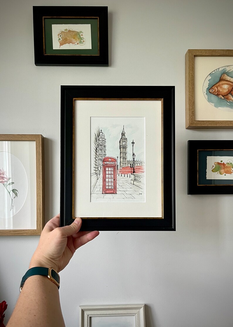 Cityscape art print of London in a classic frame, perfect for gallery wall in retro or loft-style interiors