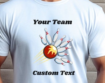 May include: White t-shirt with a bowling ball and pins graphic. The text "Your Team" and "Custom Text" is printed on the shirt.