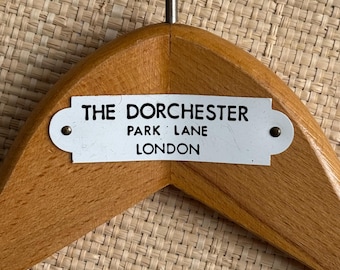 Vintage wooden hangers from prestigious hotels around the world