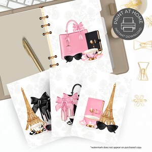 May include: Digital print featuring a pink handbag, black sunglasses, a teacup, and a black notebook. The design includes a gold Eiffel Tower, bows, and a floral background. The words "PRINT AT HOME" and "INSTANT DOWNLOAD" are also visible.
