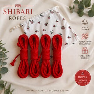 May include: Four coiled red ropes and a white cotton drawstring storage bag with a small red floral pattern. The text reads SHIBARI ROPES, SOFT & DURABLE, PERFECT FOR SHIBARI ART, GREAT GIFT CHOICE, and 4 ROPES 6MM x 8M (0.24" x 26FT).