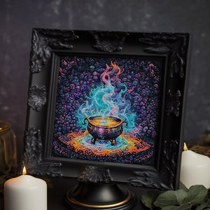 May include: A black framed picture of a cauldron with colourful smoke rising from it, set on a black stand. The picture is surrounded by candles and autumn foliage.