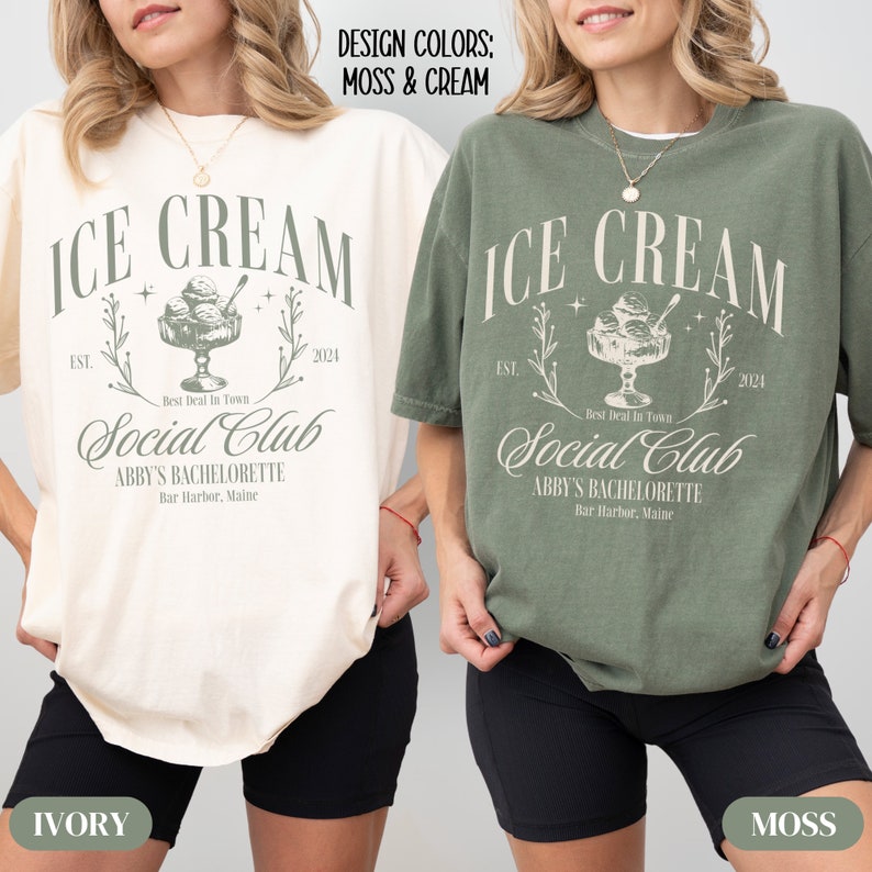 May include: Two t-shirts with the text "ICE CREAM Social Club" in a vintage style font. The text is in cream on a moss green t-shirt and in moss green on a cream t-shirt. The text "ABBY'S BACHELORETTE" is below the main text. The t-shirts are shown on models wearing black shorts.