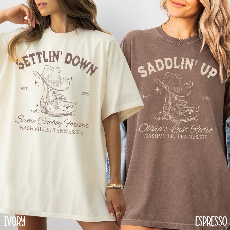 May include: Two oversized t-shirts with a cowboy boot graphic and text. The ivory t-shirt says "Settlin' Down" with the text "Same Cowboy Forever" and "Nashville, Tennessee". The espresso t-shirt says "Saddlin' Up" with the text "Olivia's Last Rodeo" and "Nashville, Tennessee".