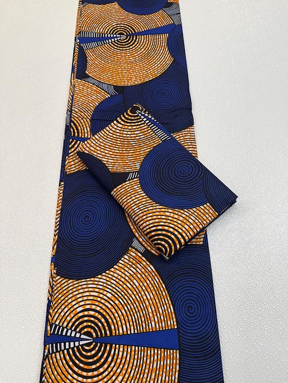 African Wax Print Fabric – Royal Blue & Gold Wax Print | Ankara Fabric | Concentric Circles With Spirals Print sale by 3 or 6 yards.