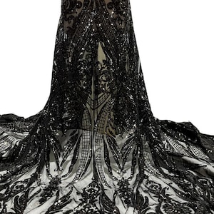 May include: Black sequined fabric with a floral pattern. The sequins are arranged in a geometric pattern, creating a shimmering effect.