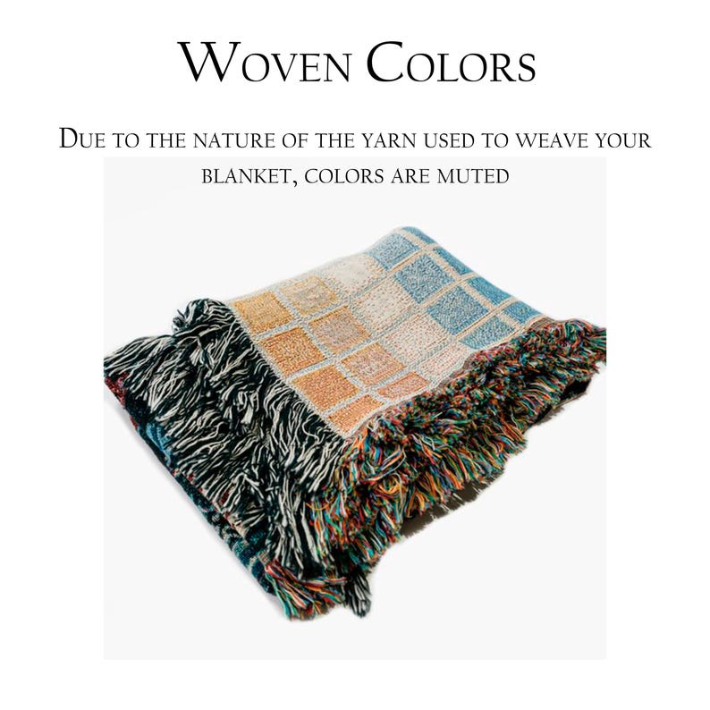 May include: A woven blanket with a geometric pattern in shades of blue, orange, and white. The blanket has a fringe border.