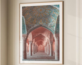 May include: A framed photograph of a colorful, ornate hallway with arched ceilings and intricate tile work. The hallway is lined with columns and leads to a distant point.