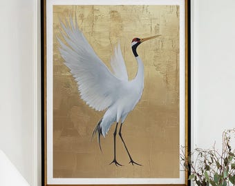 May include: A framed artwork of a white crane with outstretched wings against a gold background. The artwork is displayed above a console table with a black metal frame, a marble top, and a lamp with a white shade.