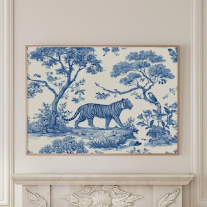 May include: A framed print with a blue and white toile design, showing a tiger in a forest setting. The artwork is displayed above a fireplace. The print adds a classic touch to the room, with a detailed depiction of trees and foliage.