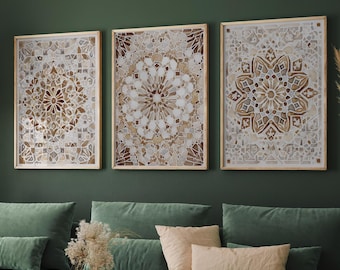 May include: Three framed wall art pieces with intricate mosaic designs in shades of beige, brown, and white. The artwork is displayed above a green sofa with beige pillows. A wooden coffee table and a woven basket complete the living room setting.