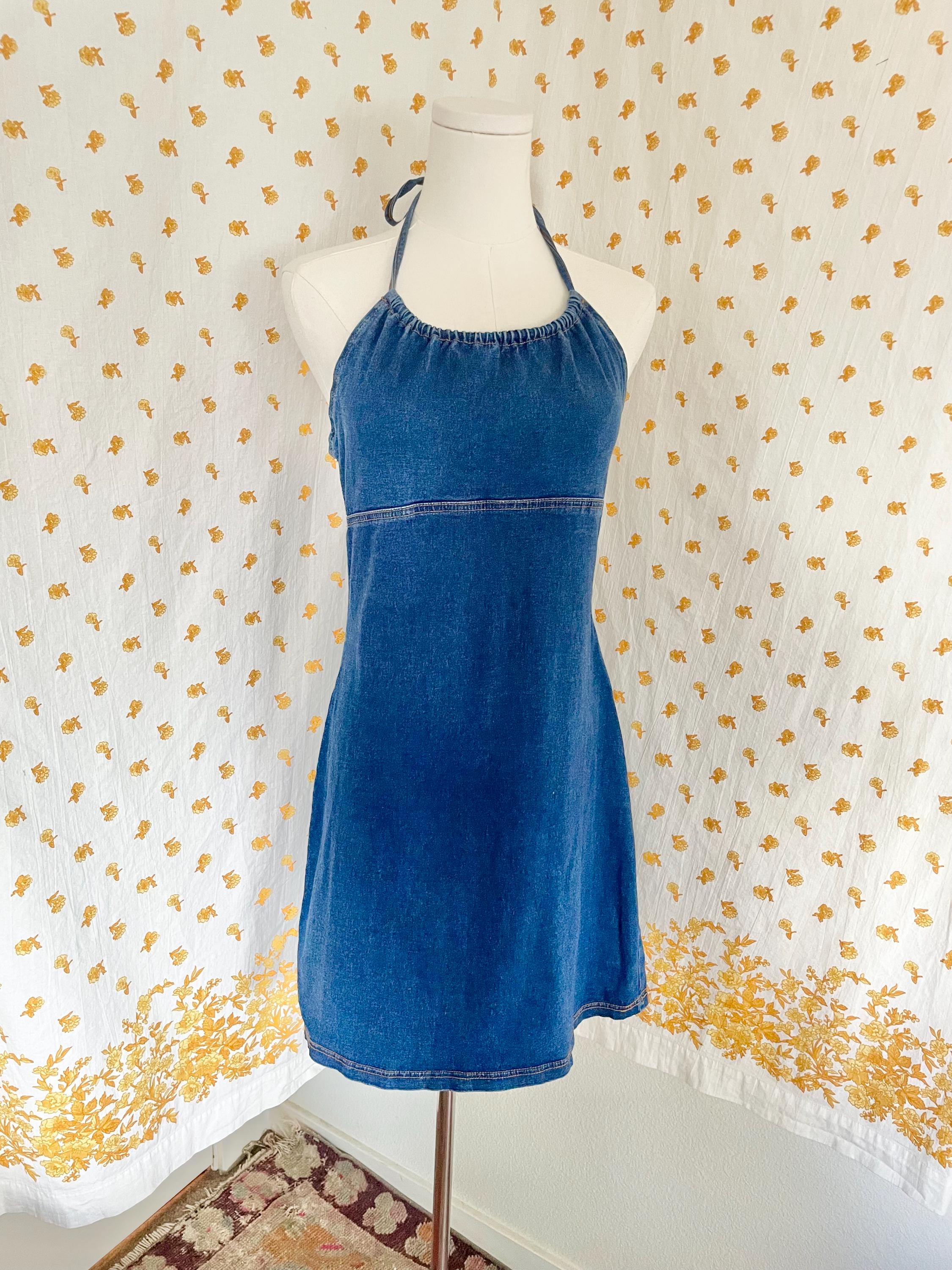 navy blue dress for baby girl Dress Over Jeans Trend From the 2000s main image 1