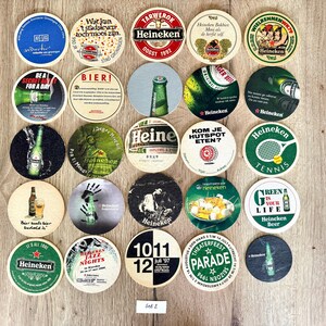 25 sottobicchieri vintage della Heineken. Da tutto il mondo. Marchio di birra olandese. Set 2