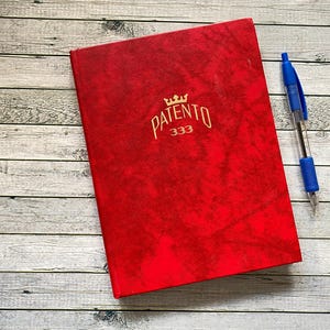 A5 red poststamp album patento 333 with stamps from the pilipinas