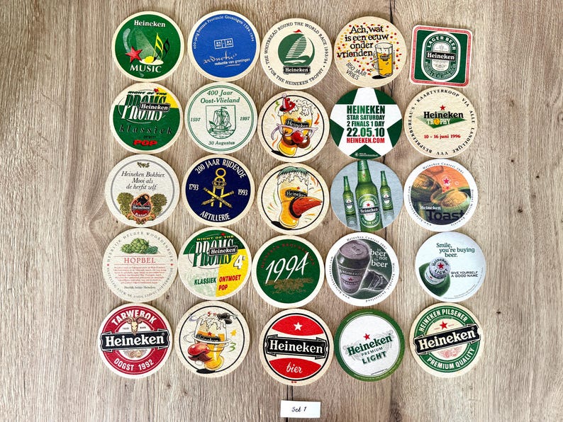 25 sottobicchieri vintage della Heineken. Da tutto il mondo. Marchio di birra olandese. Set 1