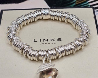 Links of london disc charm best sale