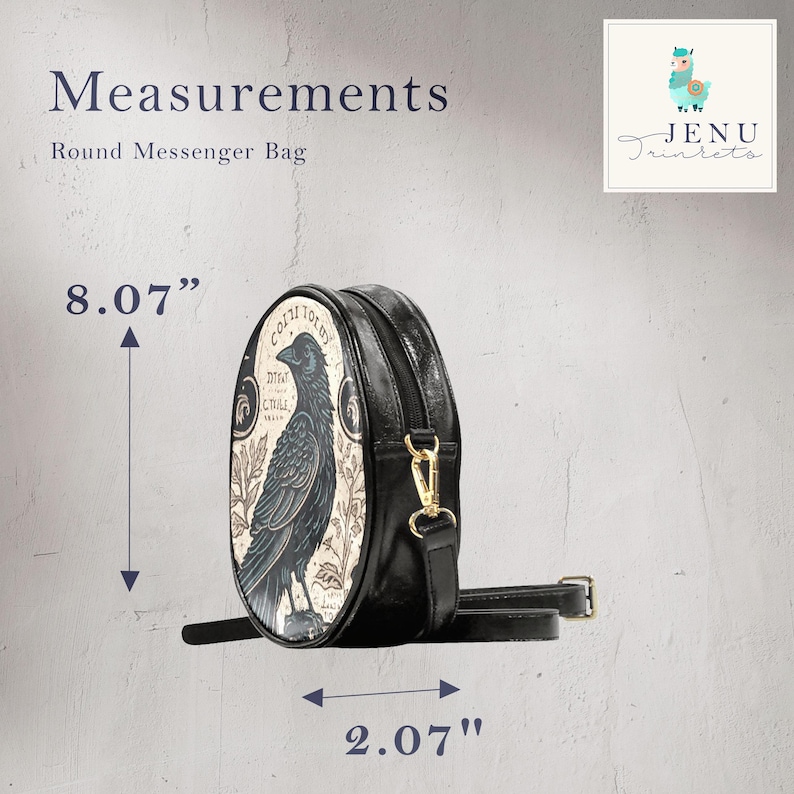 May include: Round messenger bag with a raven illustration. The bag is black with a decorative panel featuring a detailed raven design. The bag is 8.07 inches high and 2.07 inches wide, with a long adjustable strap and gold-colored hardware.