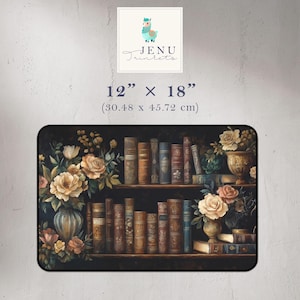 May include: A 12" x 18" doormat with a dark background featuring a bookshelf filled with antique books and two floral arrangements with roses and other flowers in vases. The text "JENU Trinkets" is in the upper right corner of the image.